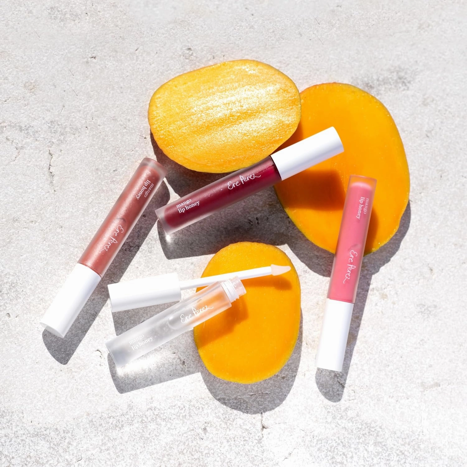Ere Perez - Natural Mango Lip Honey | Hyaluronic Acid, Jojoba Seed Oil | Hydrate, Moisturize, Nourish, Soften | Vegan, Cruelty-Free, Clean Beauty (Glaze, 0.10 fl oz | 3 ml)